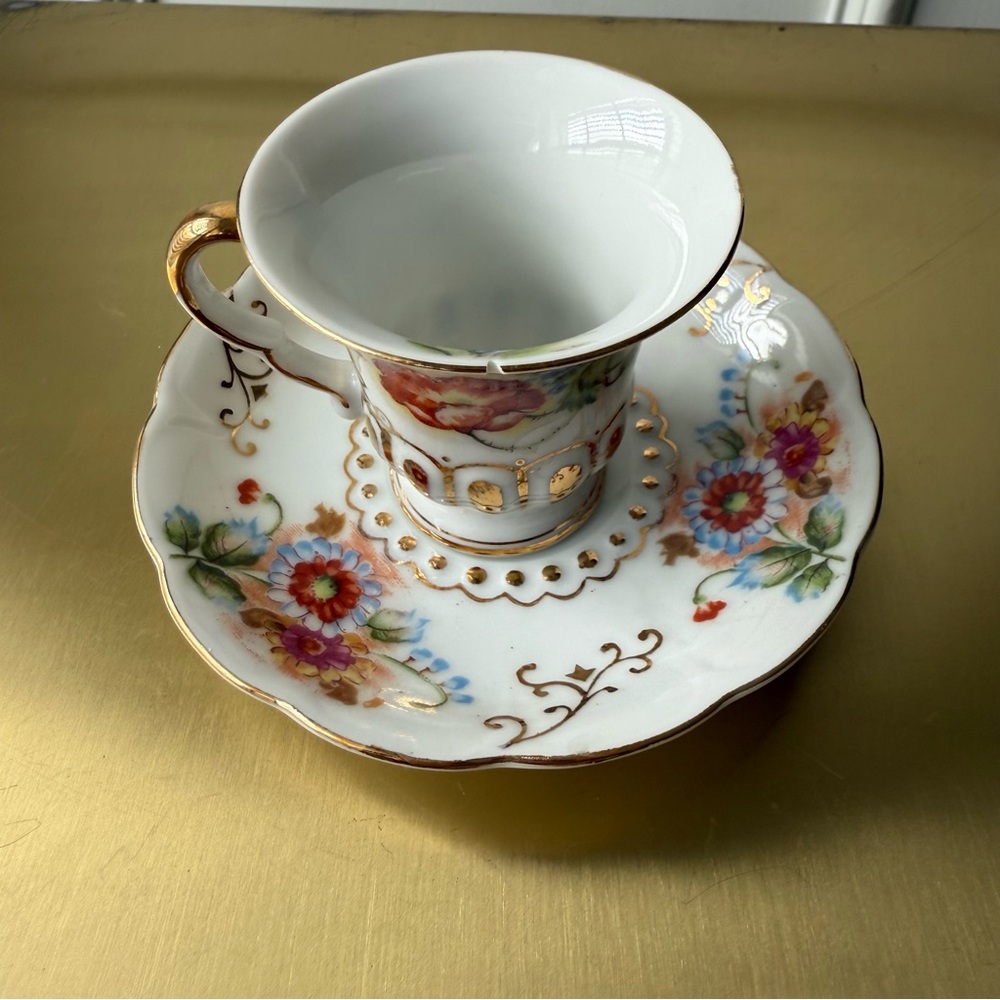Floral Teacup and Saucer Set with Gold Accents